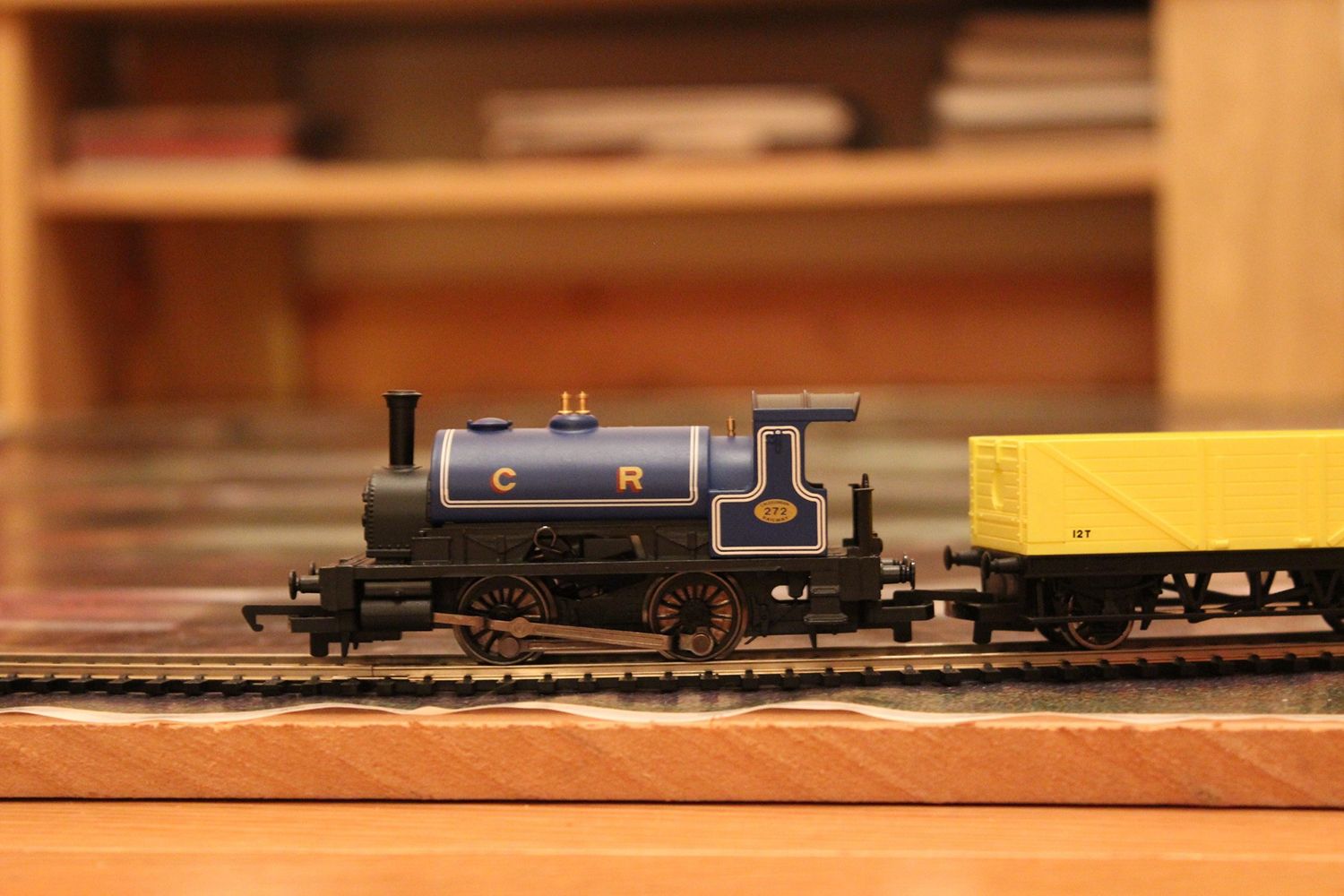 A Hornby model railway locomotive running on some track