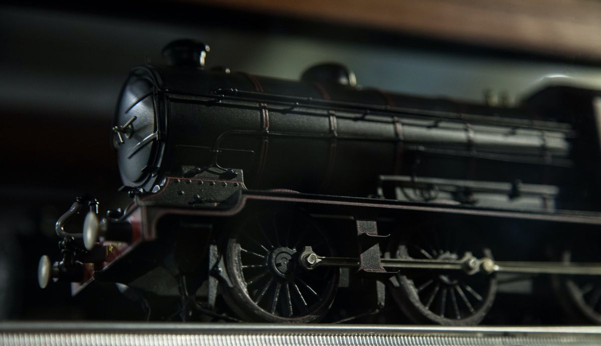 An expensive locomotive being displayed on a model train layout
